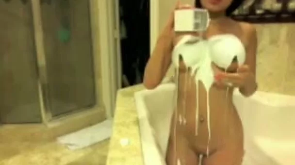 Homemade solo with sexy me pouring cream on my Asian tits