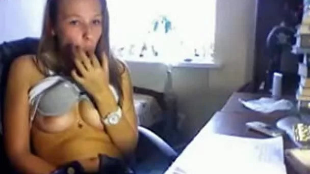 Skinny hot young brunette flashes her boobies on webcam
