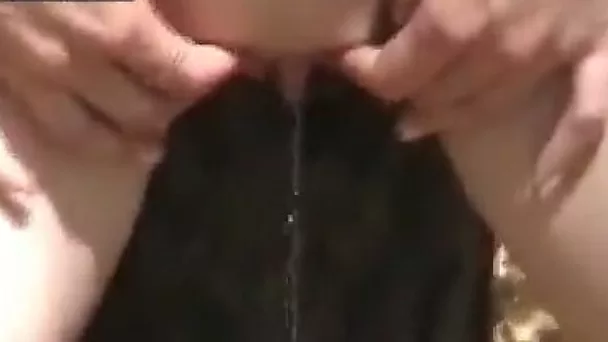 Sexy redhead chick gets naked and pees in the forest