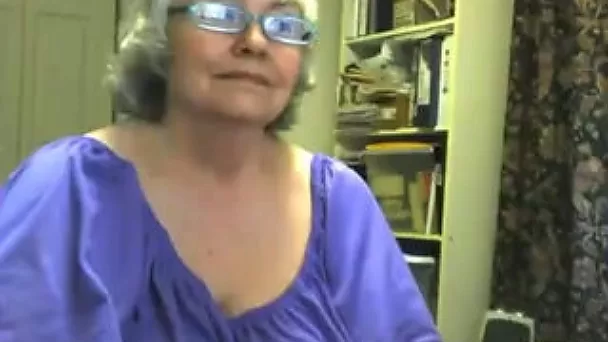 Lewd chubby granny shows her meaty shaved crotch for the cam