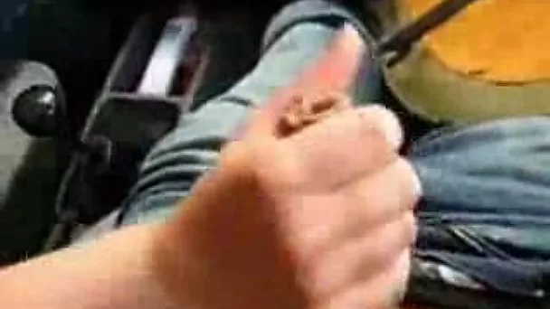 Horny redhead girlfriend gives me handjob in my car
