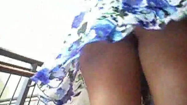 As the wind blows my chubby coed accidentally flashes her upskirt