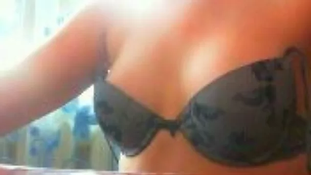 Skinny white girl shows her small tits and shaved slit