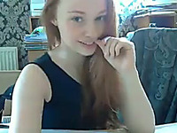 Charming redhead girl fingers her pussy and ass in webcam solo clip