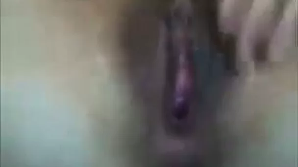 Stretching my shaved pussy out in front of a camera