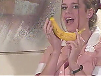Horny waitress takes her uniform off and plays with a banana