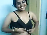 Chubby nympho in glasses puts on a good striptease show