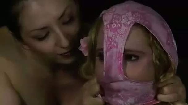 Lusty blonde chick with panties on her face wears sexy lingerie