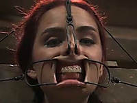Hot redhead chick with pins on her tongue got her mouth stretched
