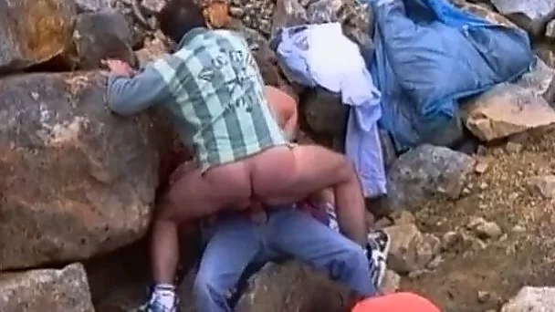 Extra horny slut with big tits engages in FMM threesome