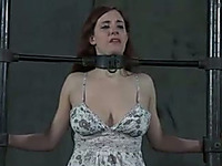 Redhead slut wearing cute dress is brutally bounded by her master and mmistress