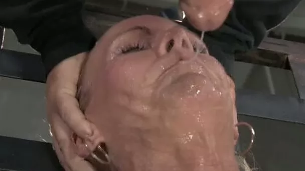 Stunning blonde slave girl with great shapes is face fucked and toyed