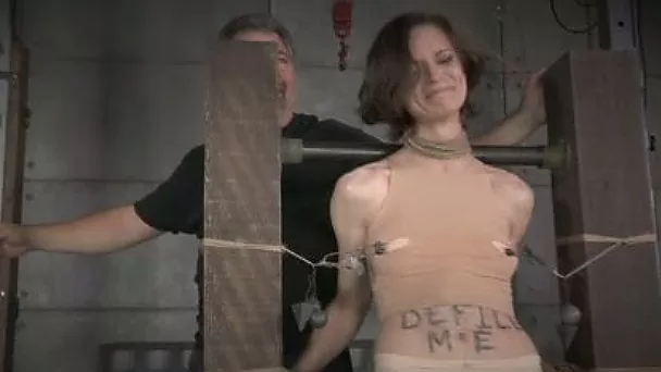 Bounded lady with flat chest bounded and toyed by two masters