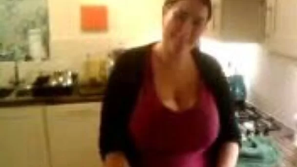 My BBW busty wife does kitchen work and shakes her big boobs