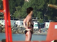 Mature random lady on the beach flashed her tits accidentally