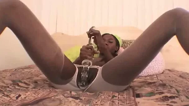 This black chick doesn't want to rush so she masturbates slowly