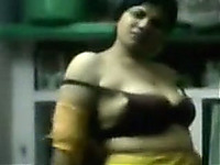 Chubby Indian skank strips and fingers her cunt indoors