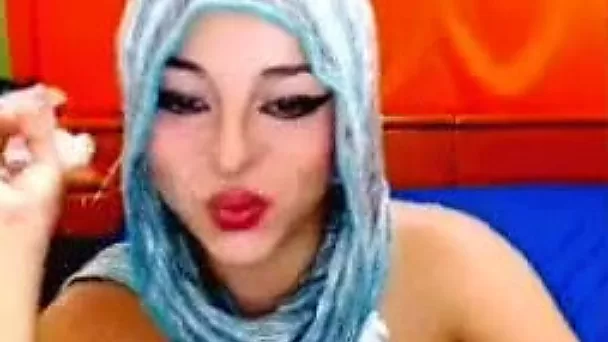 Paki slut in scarf shows her tits and fingers her cunt