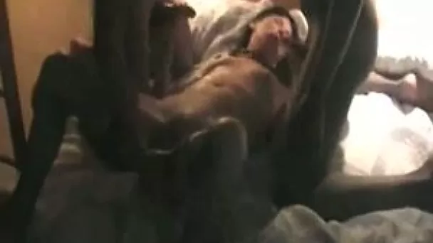 Enthusiastically sucking on two hard cocks simultaneously