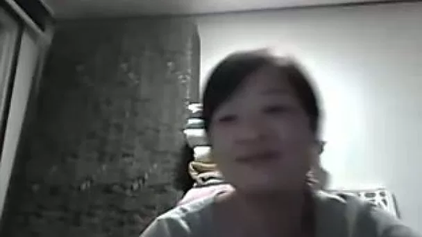 Webcam solo with Chinese chick flashing her natural boobs