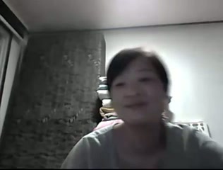 Webcam solo with Chinese chick flashing her natural boobs