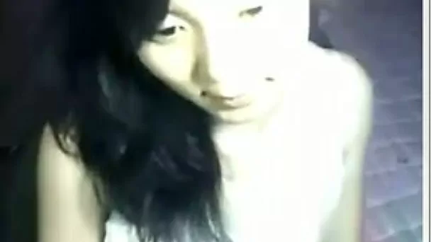 Nice webcam solo with a shy Asian chick flashing her tits