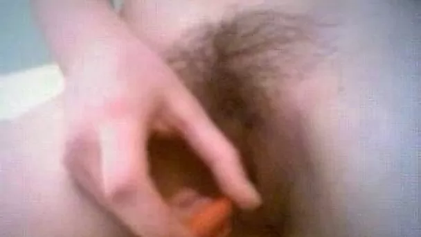 I am a crazy bitch and I like to stuff my hairy snatch with different objects