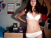Cute quite buxom amateur brunette strips and dances on webcam