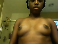 Amateur ebony teen with small tits pumps her pussy