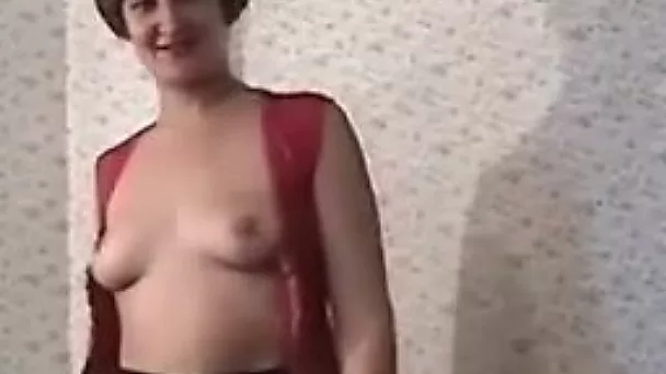 Dirty-minded amateur brunette Kristal leans over the wall to pee