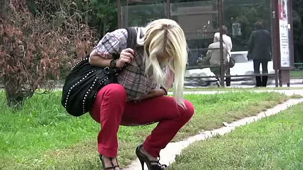 Blonde Russian college girl in the park peeing shamelessly