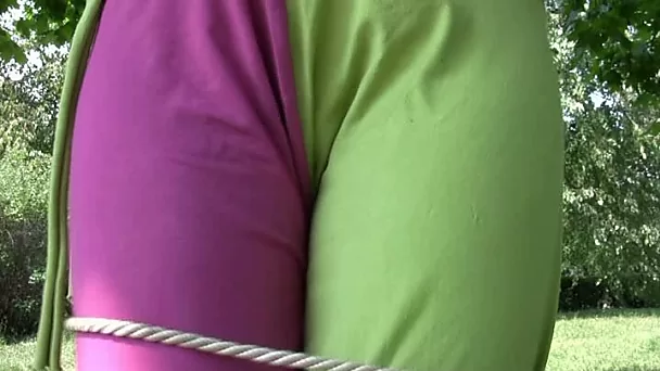Wicked blonde Russian milf tied up to the tree pisses