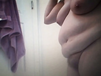 My fat BBW 28 yo girlfriend dries her curves after taking shower