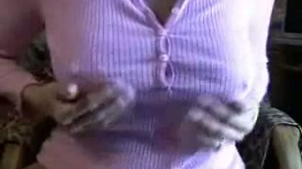 The nipples of this busty milfie push through her shirt