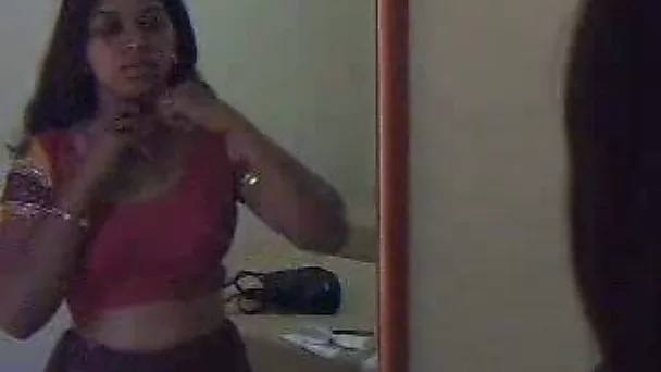 Here is a sexy and young Indian hooker dressing up