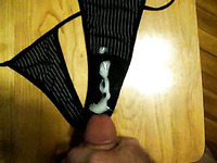 Jerking off and cumming on my wife's tiny black thongs