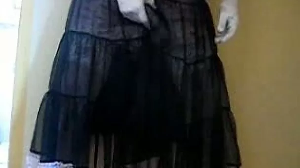 Pervert wearing his granny's long skirt jacks off and cums