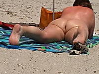 Old fat hubby strokes his BBW wife's huge ass on nude beach