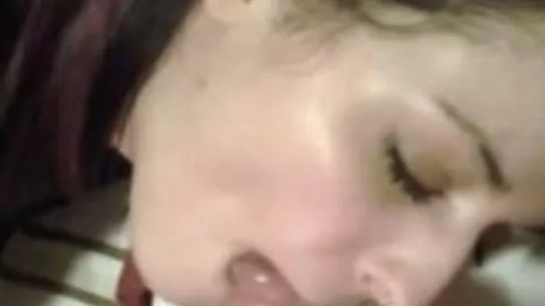 Beautiful brunette girl sucks on a hard cock to a facial