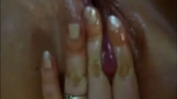 My naughty voracious girlfriend loves teasing her oiled shaved cunt