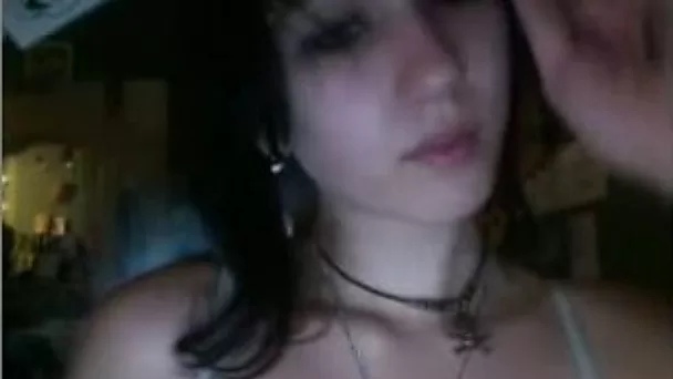 Brunette gal plays with her saggy tits during webcam show