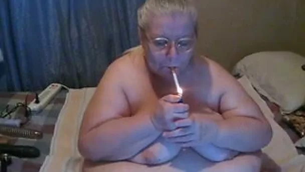 Webcam solo with nude obese granny smoking a cigarette