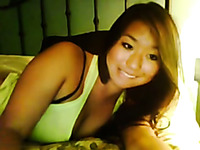 Asian webcam hussy enjoys fingering her shaved pussy