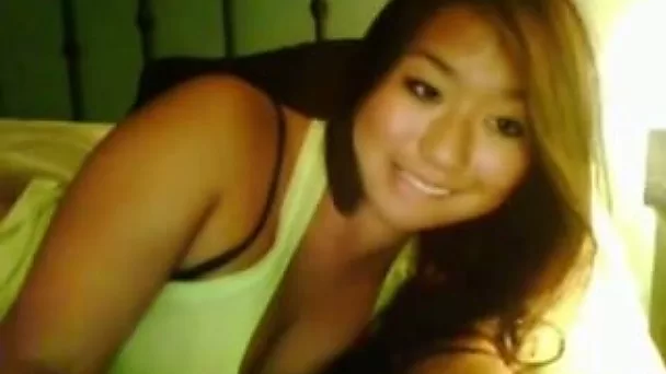 Asian webcam hussy enjoys fingering her shaved pussy