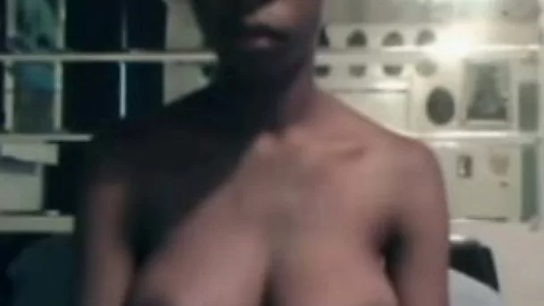 Ebony webcam bitch boasts of her big natural boobs