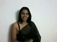 Lewd Desi MILF shows off her saggy boobies and booty also while undressing
