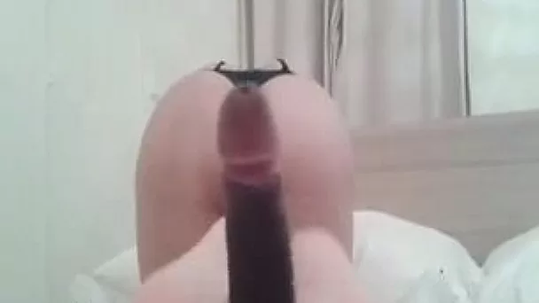 White pale naughty GF provides her black BF with a nice footjob