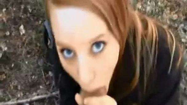 Dirty-minded amateur redhead flashes her booty and sucks dick outdoors