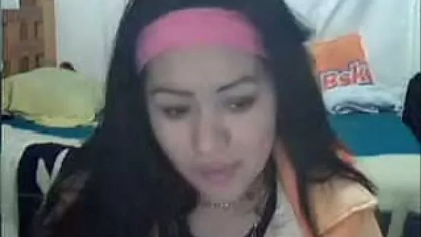 Brunette sexy girl was fully dressed but she flashed her tits