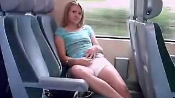 Sweet blonde girlfriend masturbates on a train seat